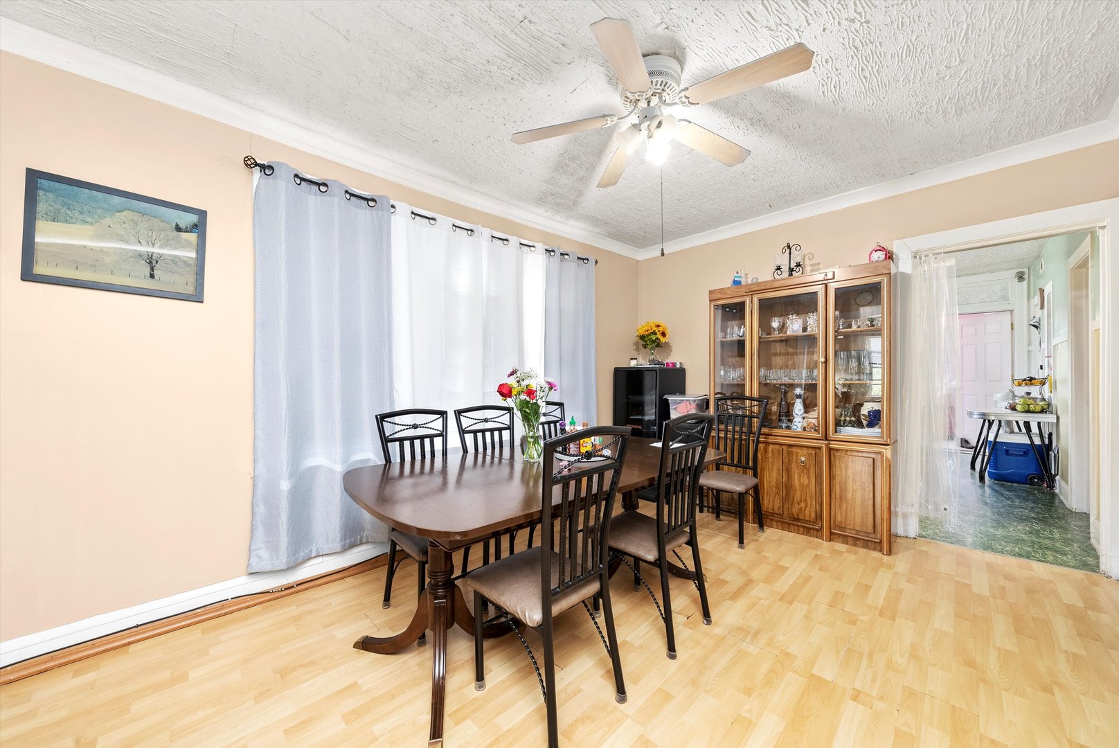 4629 West Parker Avenue Chicago, IL 60639 - Photo 13 of 29 a dining room with furniture and window