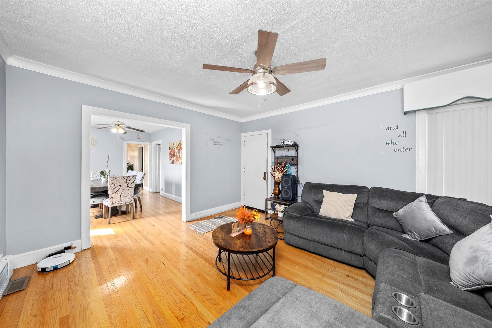 4629 West Parker Avenue Chicago, IL 60639 - Photo 3 of 29 a living room with furniture and a wooden floor