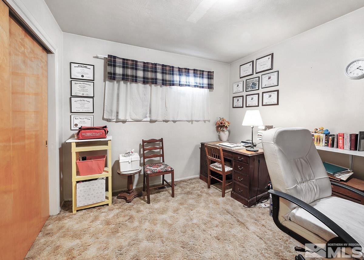 412 East 8th Street Reno, NV 89512 - Photo 12 of 40 a room with furniture and a piano