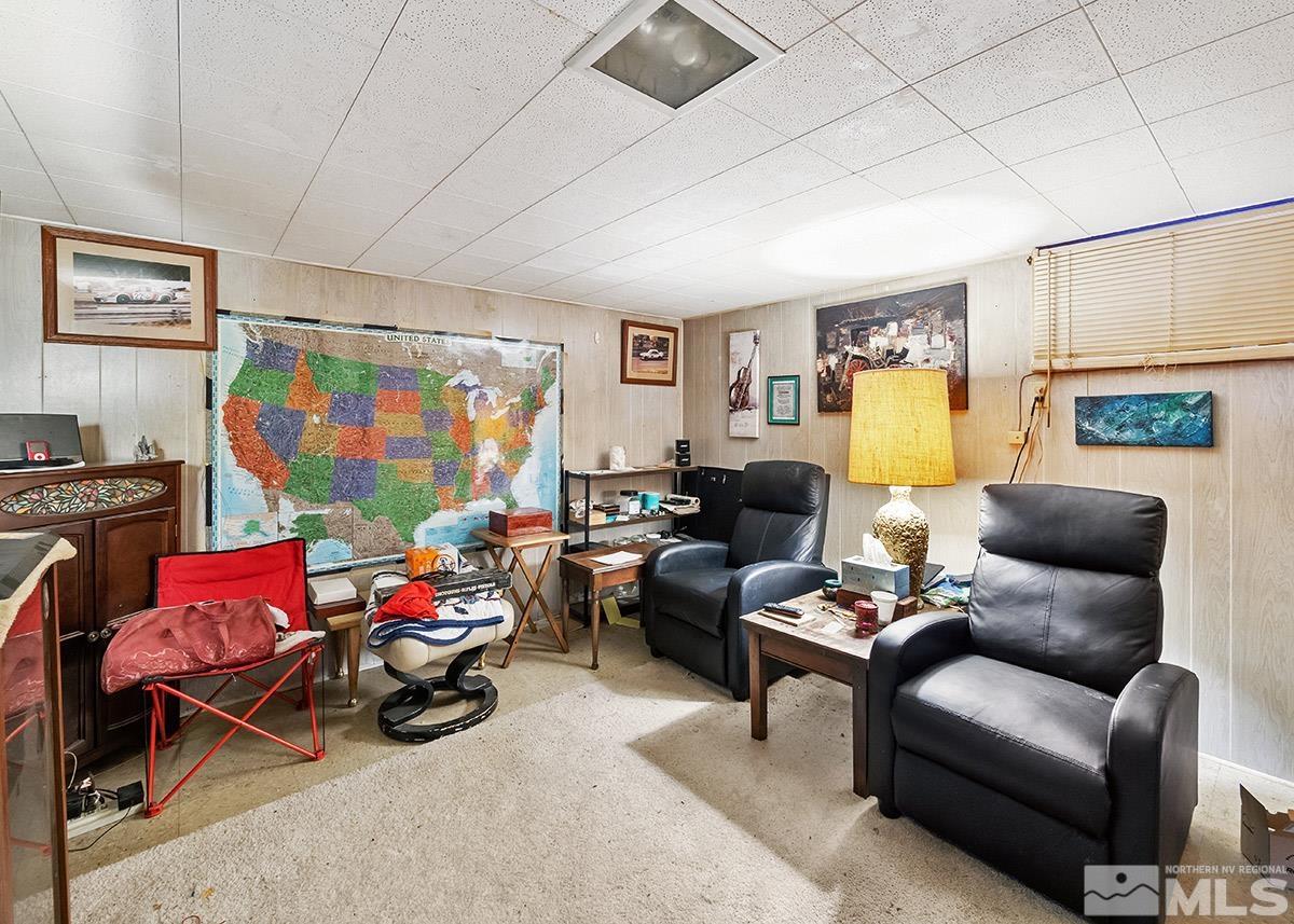 412 East 8th Street Reno, NV 89512 - Photo 17 of 40 a living room with furniture and a flat screen tv