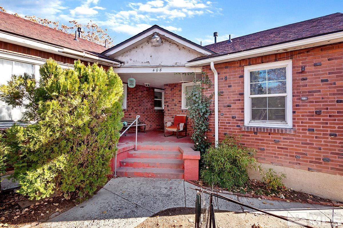 412 East 8th Street Reno, NV 89512 - Photo 22 of 40 a front view of a house with a porch