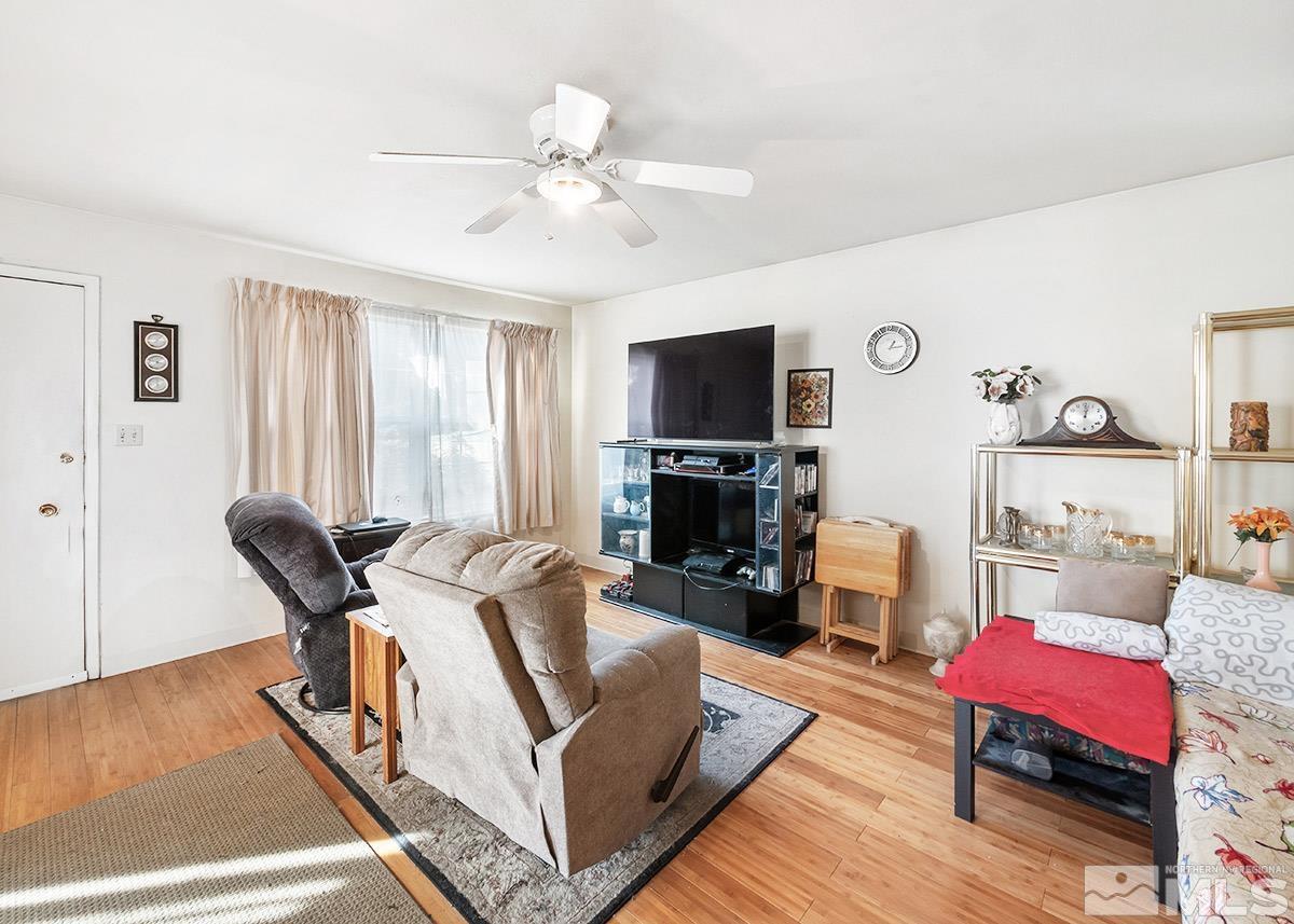 412 East 8th Street Reno, NV 89512 - Photo 3 of 40 a living room with furniture and a flat screen tv