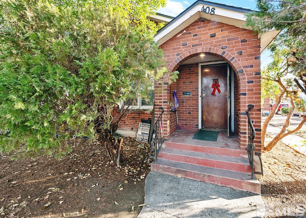 412 East 8th Street Reno, NV 89512 - Photo 40 of 40 a front view of a house with a tree