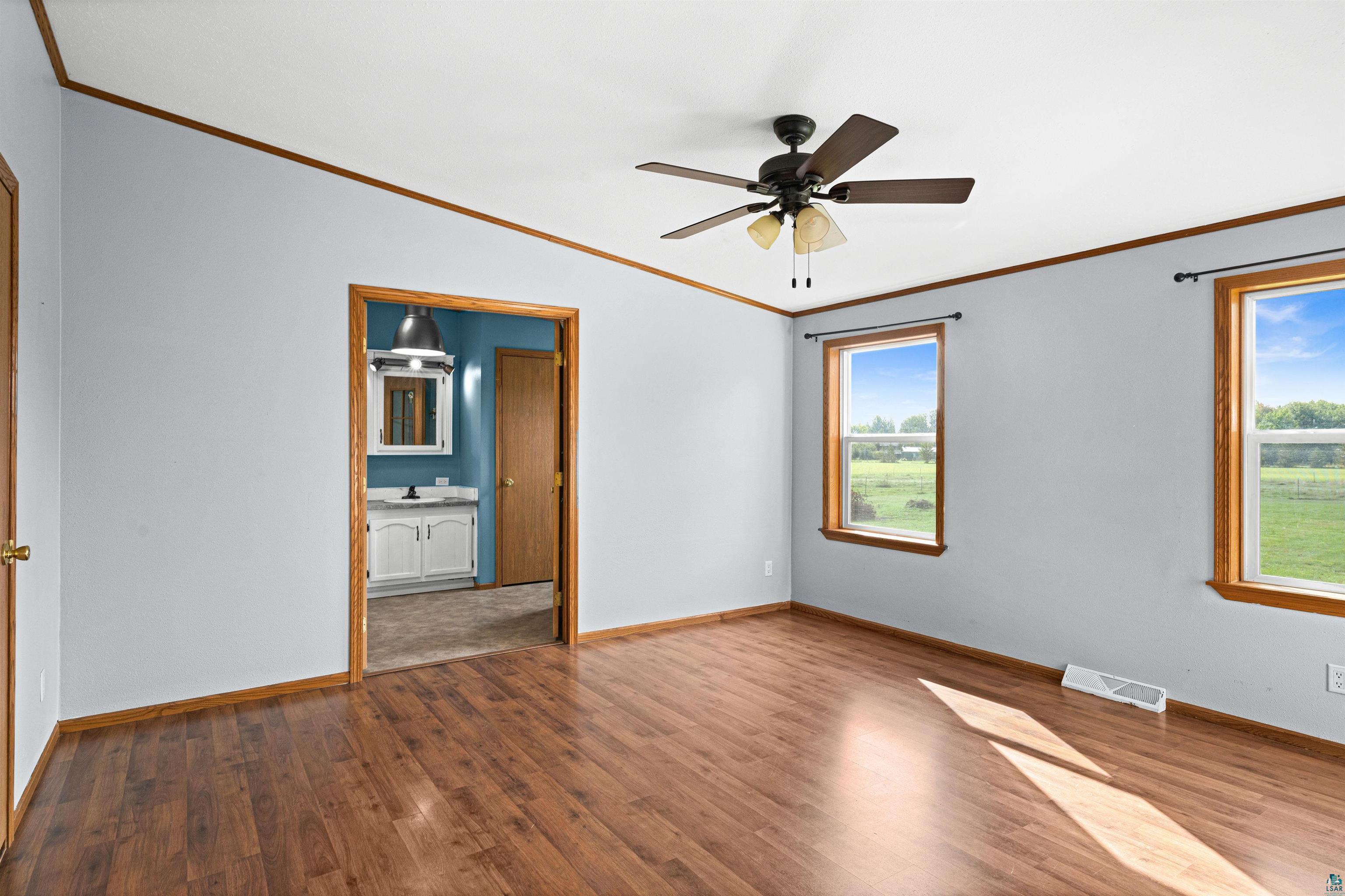 3126 Beyer Road Duluth, MN 55804 - Photo 16 of 23 Spacious room with laminate flooring and light gray walls