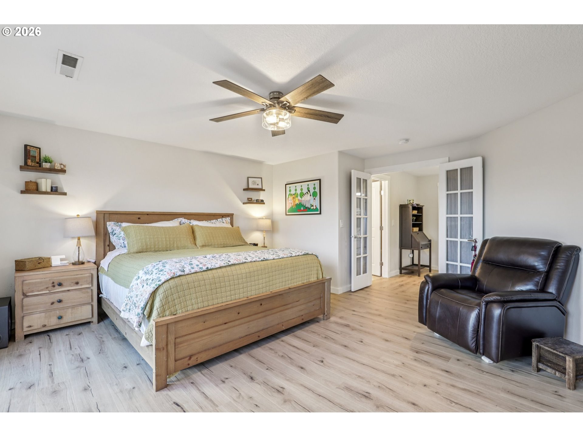 1702 Northeast 70th Street Vancouver, WA 98665 - Photo 21 of 32 a bedroom with a bed couch and a window