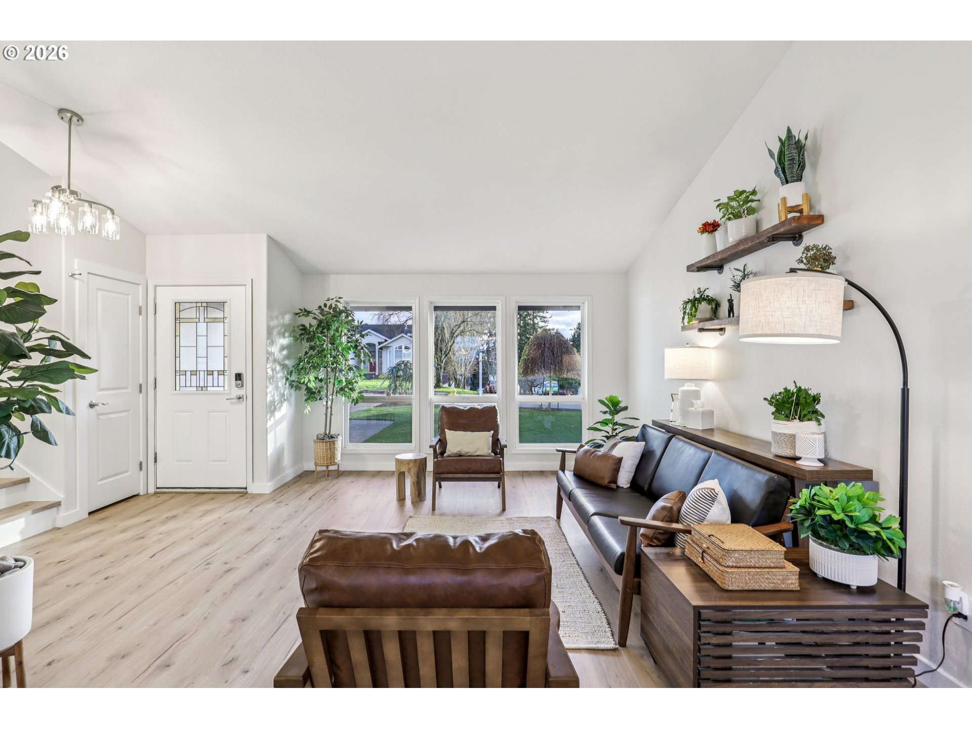 1702 Northeast 70th Street Vancouver, WA 98665 - Photo 8 of 32 a living room with furniture and a potted plant