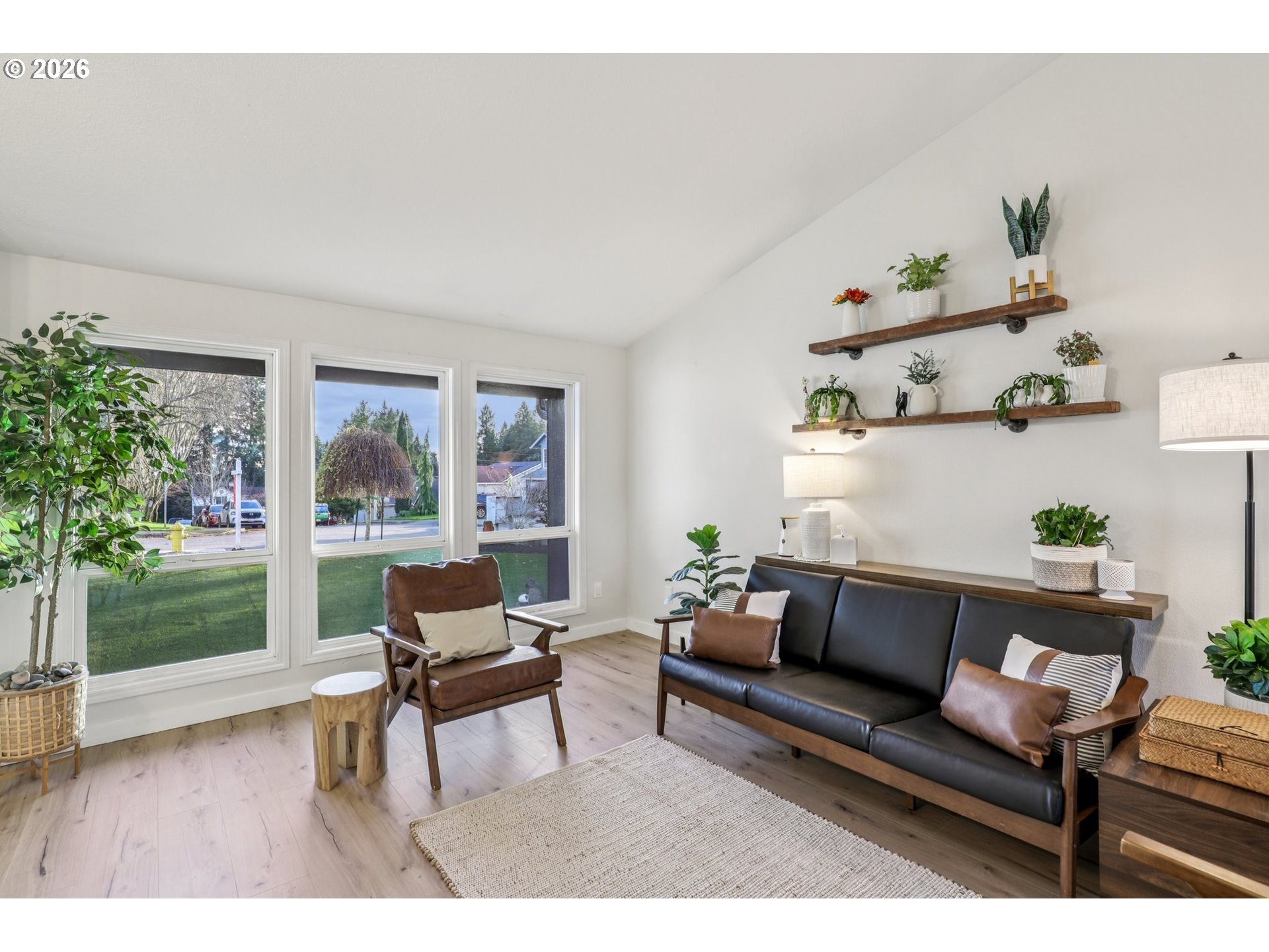 1702 Northeast 70th Street Vancouver, WA 98665 - Photo 9 of 32 a living room with furniture and a large window