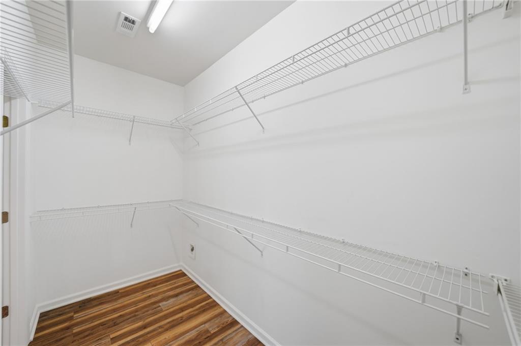 3901 Delfaire Trace Cumming, GA 30040 - Photo 30 of 45 a view of a room with racks on the wall