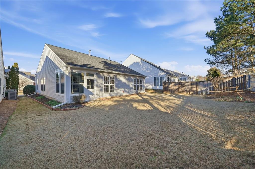 3901 Delfaire Trace Cumming, GA 30040 - Photo 7 of 45 a view of a house next to a road