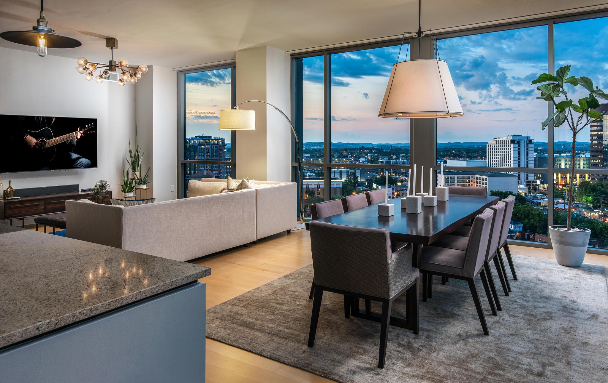 900 20th Avenue South, Unit 1001 Nashville, TN 37212 - Photo 8 of 30 a view of a dining room with furniture window and outside view