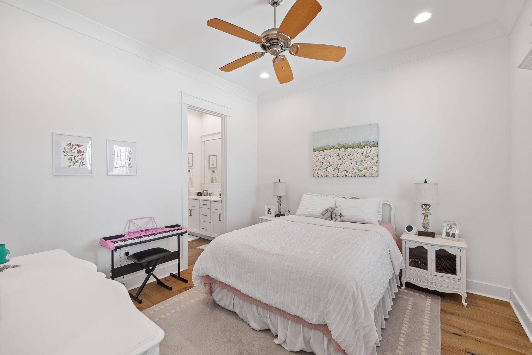 158 Trailhead Drive Inlet Beach, FL 32461 - Photo 23 of 35 a bedroom with a bed and a chandelier