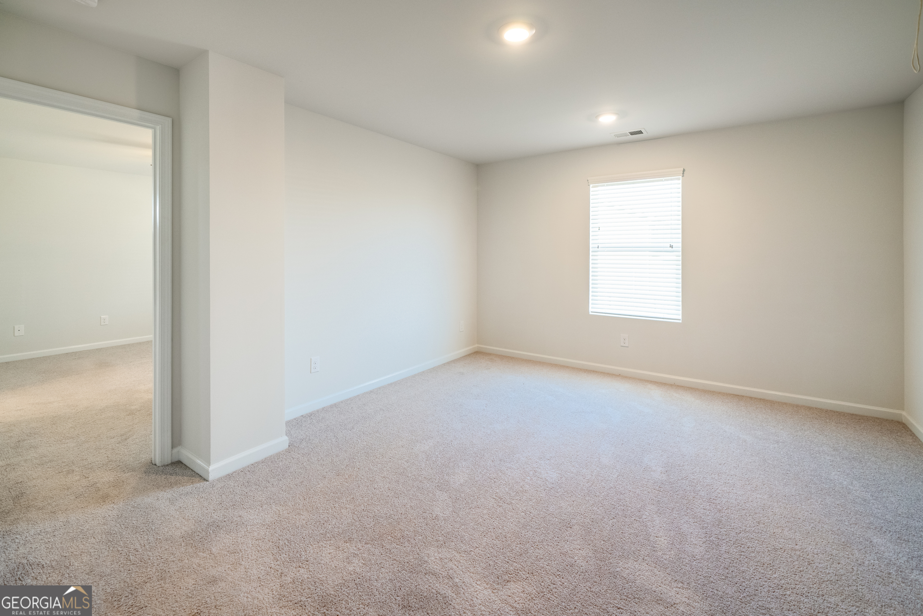 132 Fresh Laurel Lane Locust Grove, GA 30248 - Photo 15 of 24 an empty room with a window