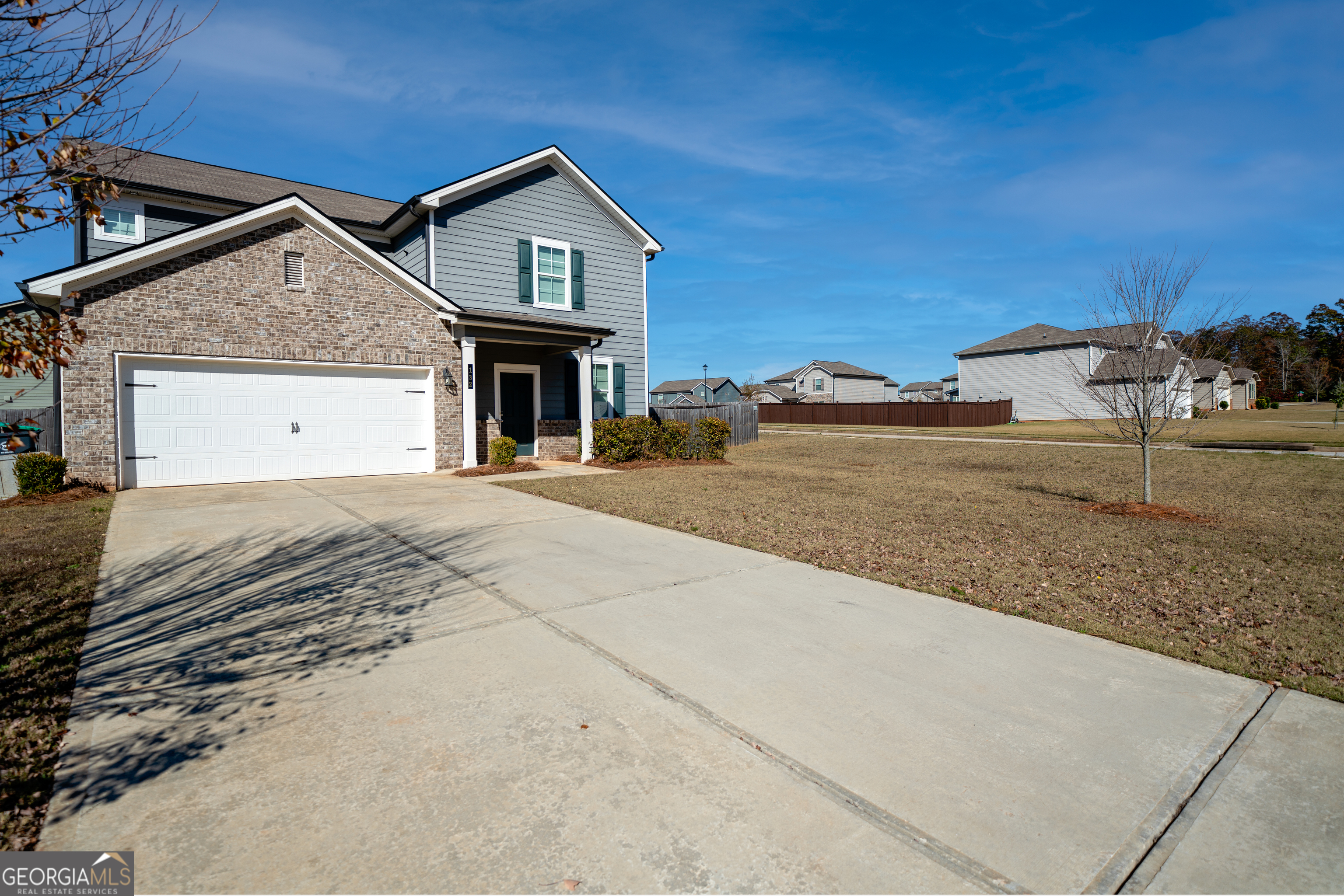 132 Fresh Laurel Lane Locust Grove, GA 30248 - Photo 2 of 24 a view of a house with a outdoor space
