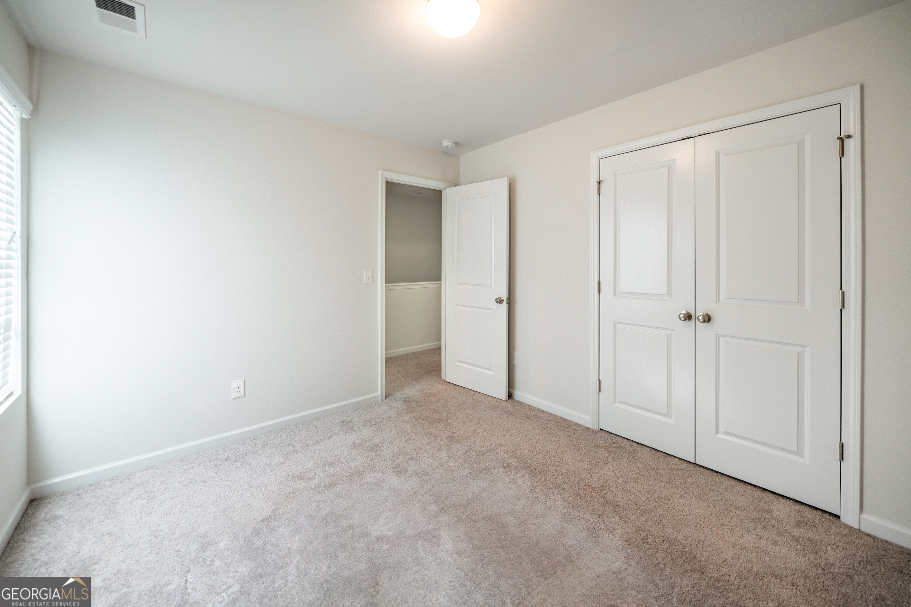 132 Fresh Laurel Lane Locust Grove, GA 30248 - Photo 24 of 24 a view of an empty room and closet area