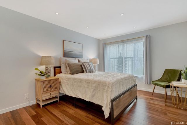 a view of a street with a building in the background