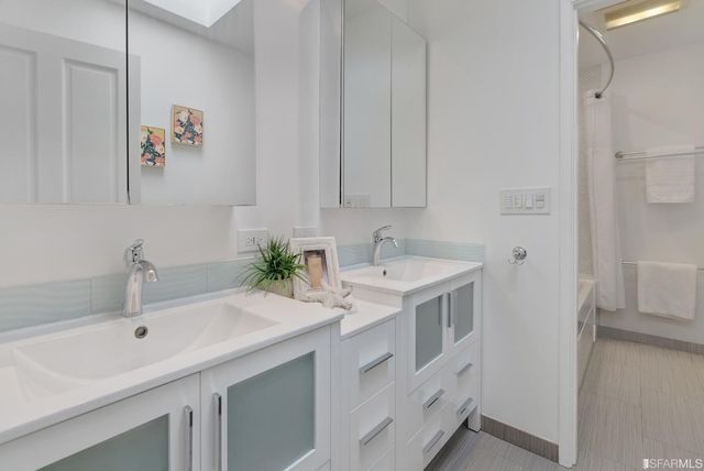 a view of a house with a tree