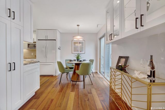 a white bath tub sitting in a bathroom
