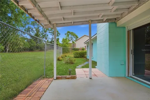 a view of a garden from a balcony