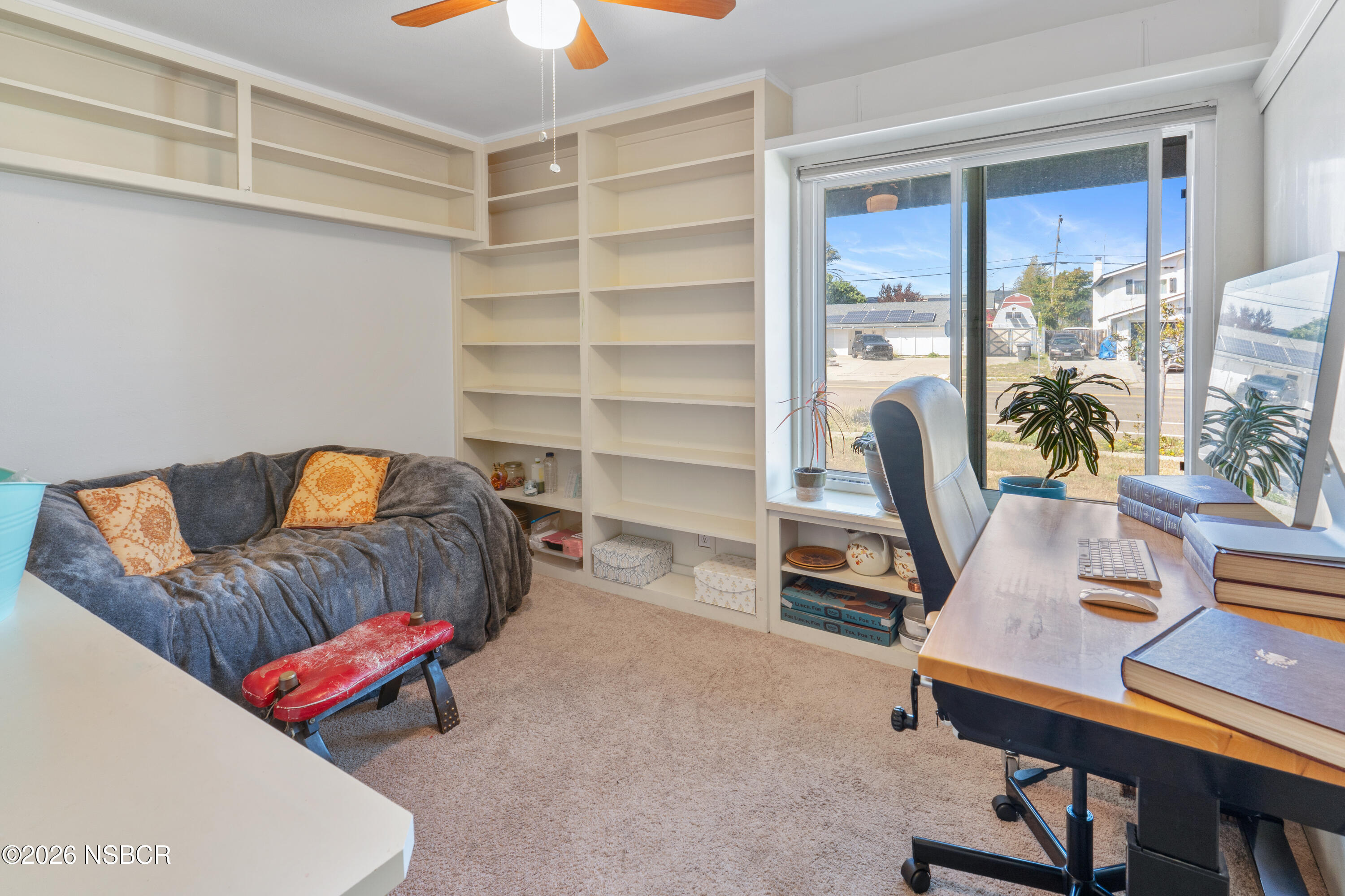 4220 Constellation Road Lompoc, CA 93436 - Photo 12 of 22 a living room with furniture and a flat screen tv