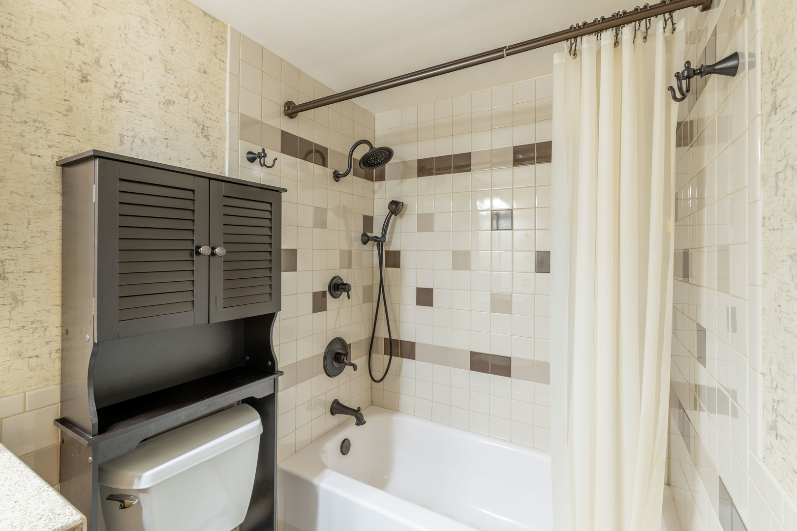 215 Fernwood Road Montgomery, IL 60538 - Photo 15 of 18 a bathroom with a bathtub and a shower