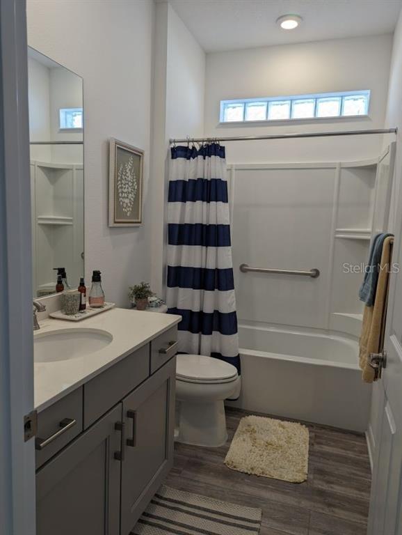 9045 Southwest 78th St Road Ocala, FL 34481 - Photo 15 of 21 a bathroom with a sink a toilet and shower