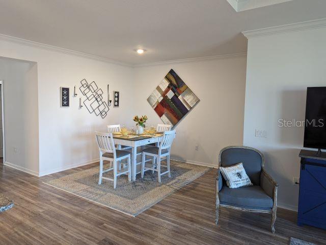 9045 Southwest 78th St Road Ocala, FL 34481 - Photo 7 of 21 a view of a livingroom with furniture and wooden floor