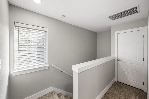 a view of hallway with window