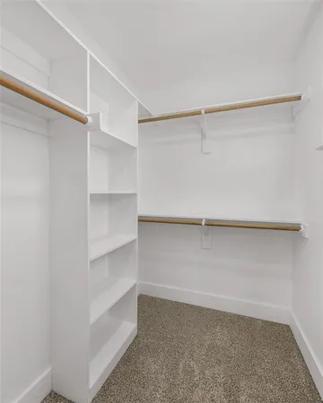 a view of an empty walk in closet
