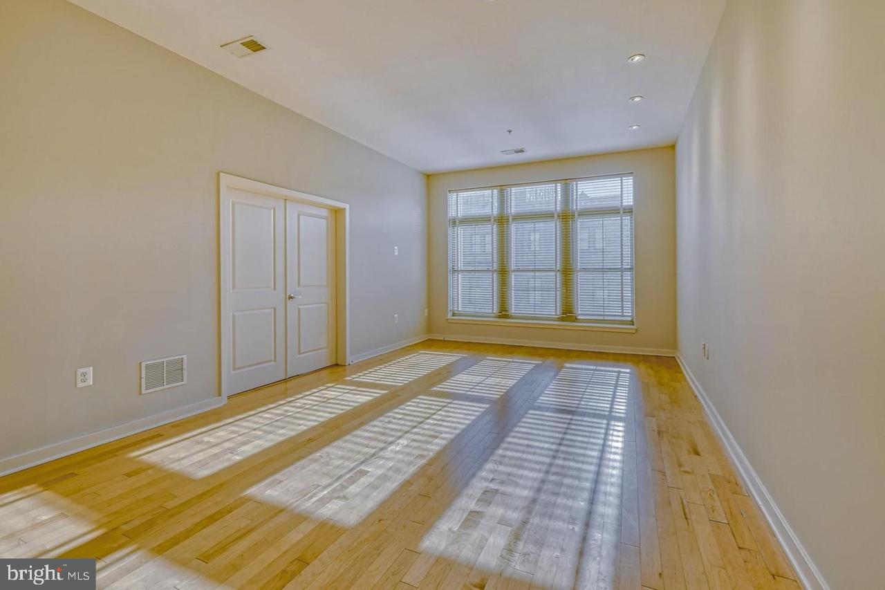 1209 North Charles Street, Unit 309 Baltimore, MD 21201 - Photo 2 of 11 a view of an empty room