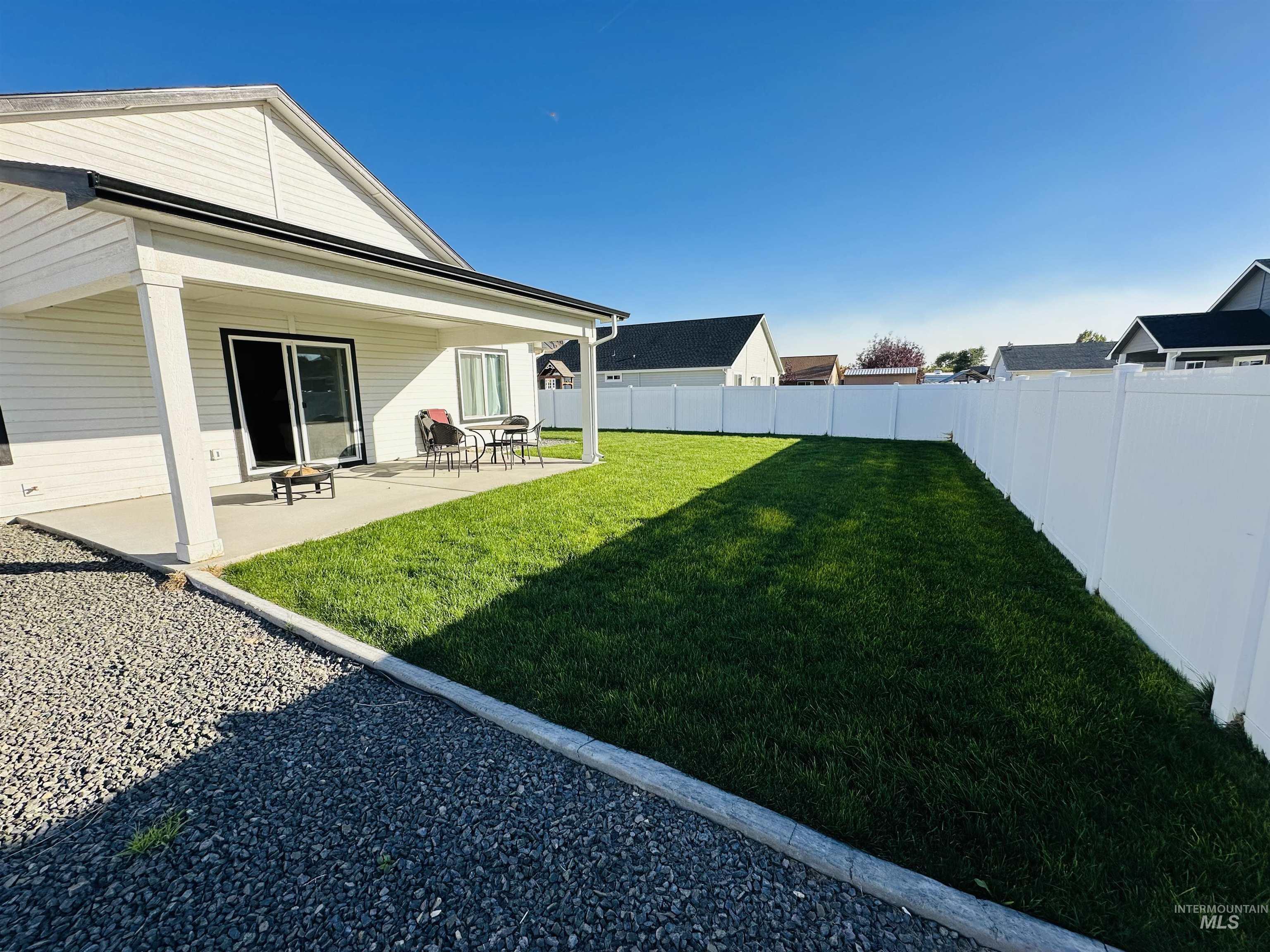 911 Campbell Street Vale, OR 97918 - Photo 27 of 37 Fenced backyard with a patio