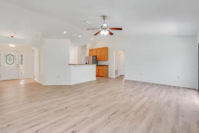 a kitchen with stainless steel appliances granite countertop a sink and cabinets