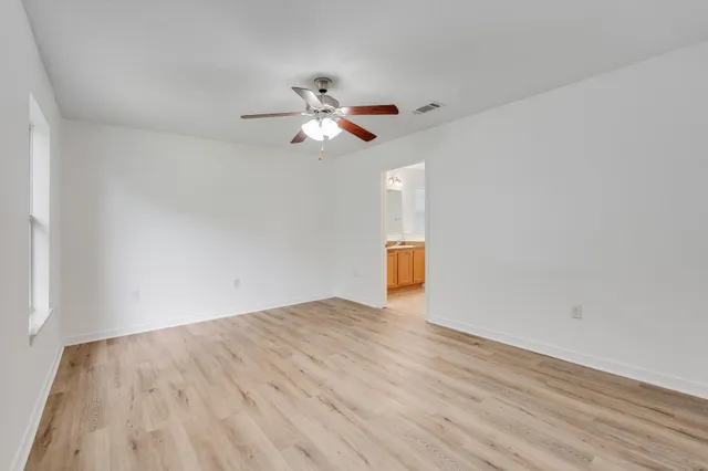 a bathroom with a bathtub and a sink