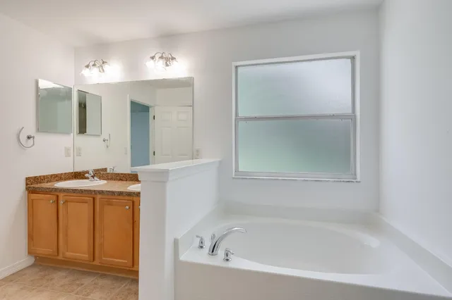 a bathroom with a shower and toilet