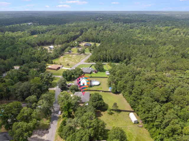 a backyard of a house with lots of green space