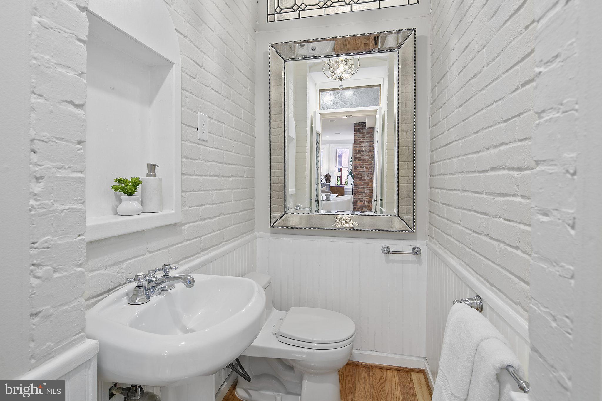 715 10th Street Northeast Washington, DC 20002 - Photo 17 of 49 Powder room tucked away on the main level