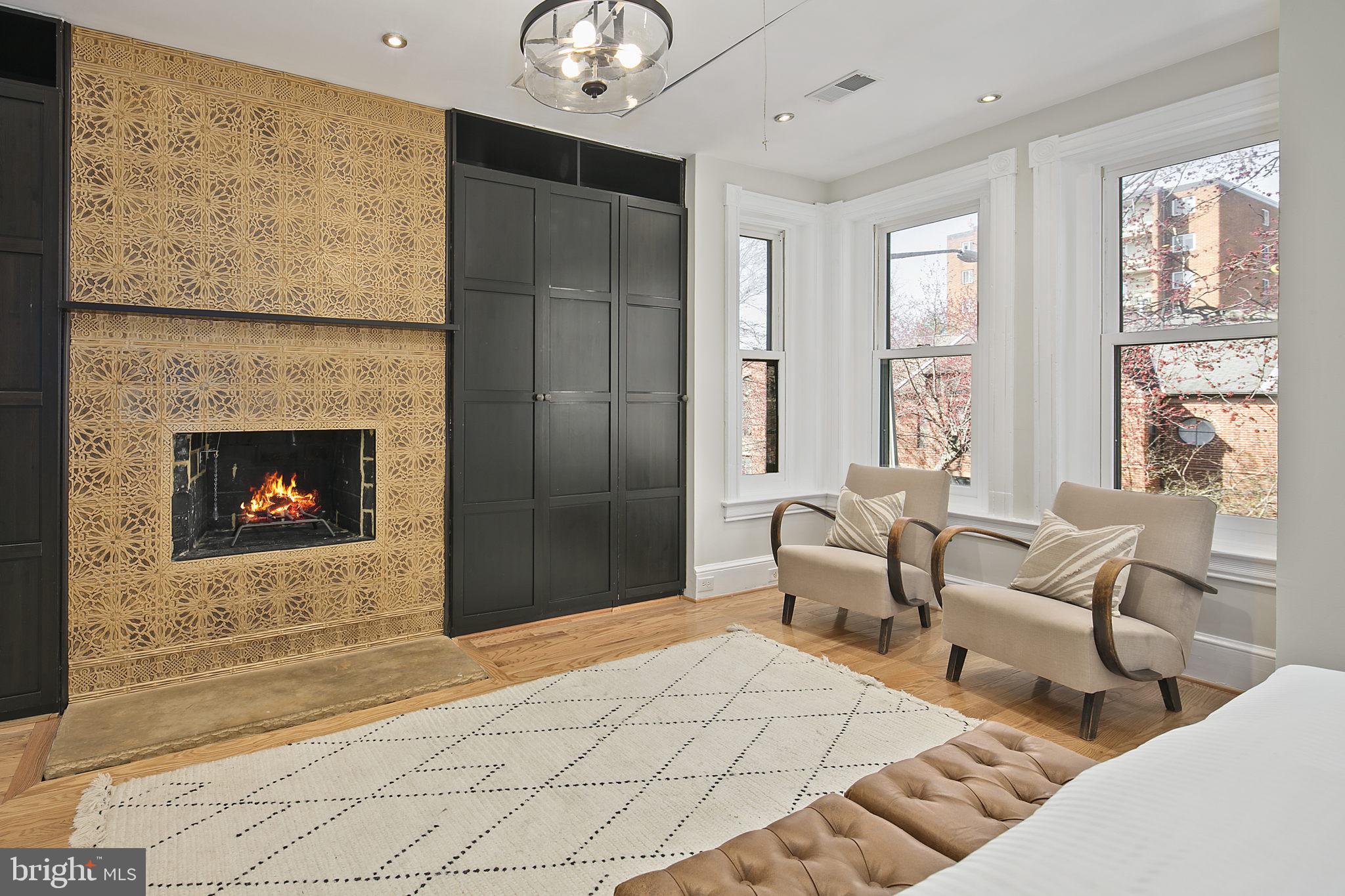 715 10th Street Northeast Washington, DC 20002 - Photo 24 of 49 Built-in closets and a fireplace w/ custom tiling