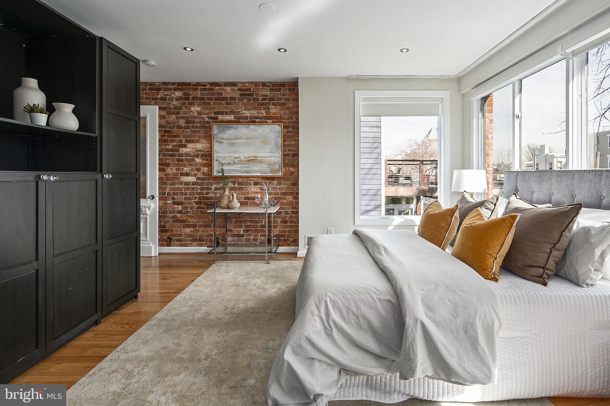 715 10th Street Northeast Washington, DC 20002 - Photo 27 of 49 Built-in closets and exposed brick walls