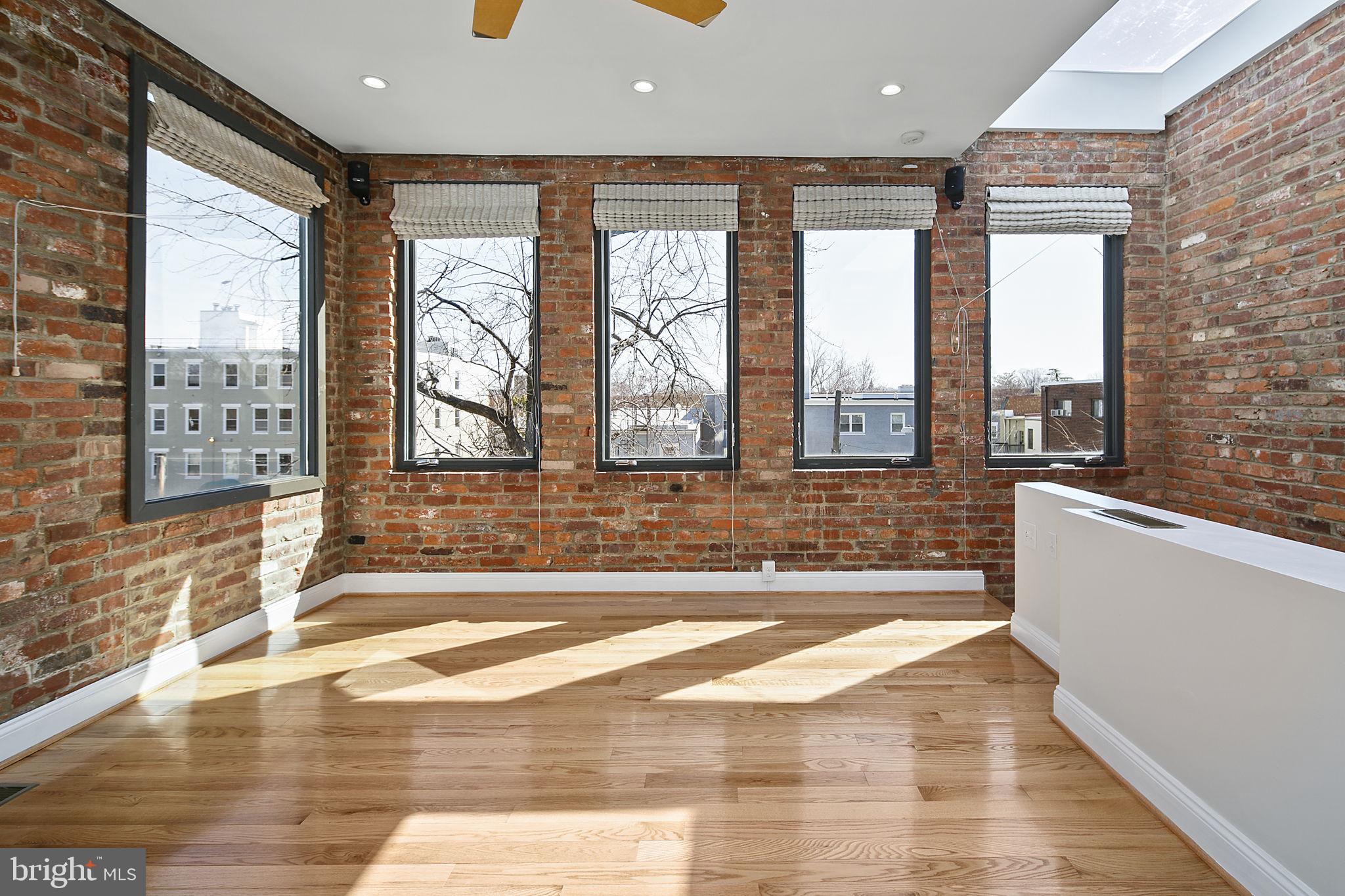 715 10th Street Northeast Washington, DC 20002 - Photo 29 of 49 Third bedroom on third floor w/ numerous windows