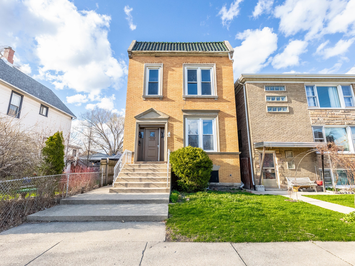 5102 West 24th Place Cicero, IL 60804 - Photo 1 of 1 a front view of a house with garden