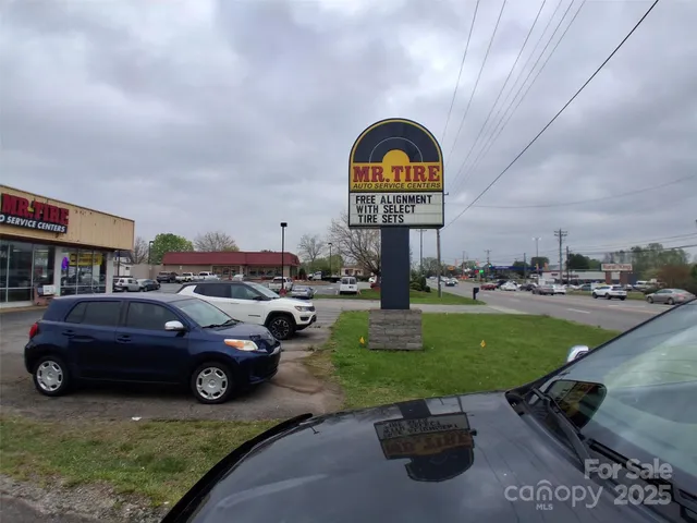 a view of a car in front of a building