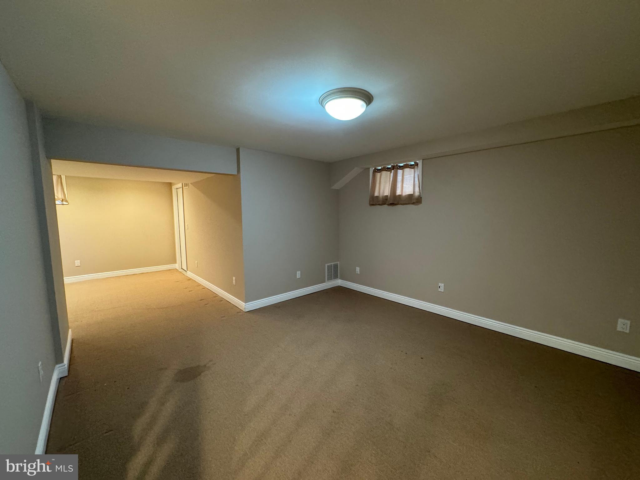 27 Yorkshire Village Road Lawrenceville, NJ 08648 - Photo 27 of 32 an empty room with a empty space and a window