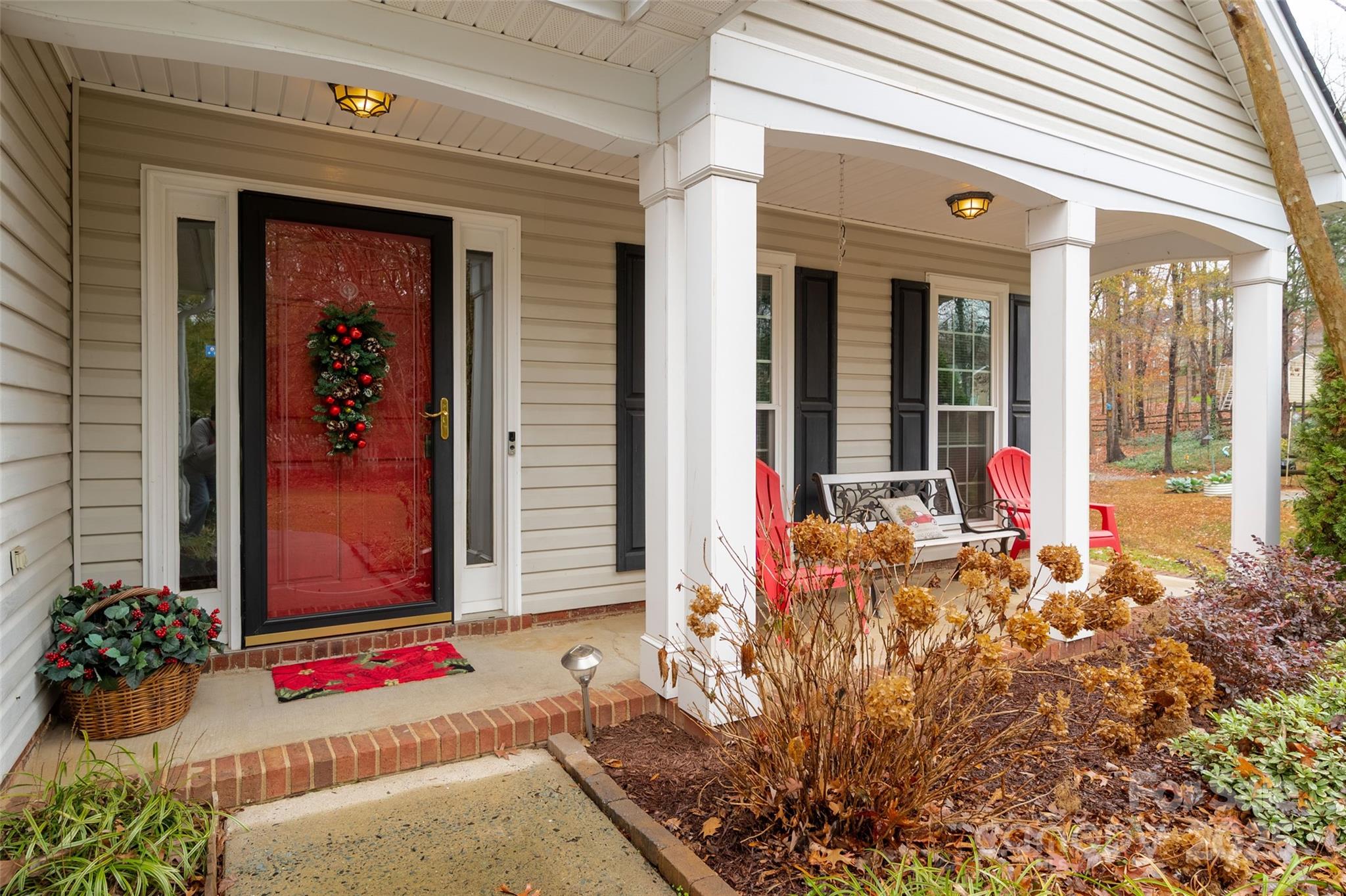 6045 Burnt Mill Run Matthews, NC 28104 - Photo 2 of 32 front view of a house with an outdoor space