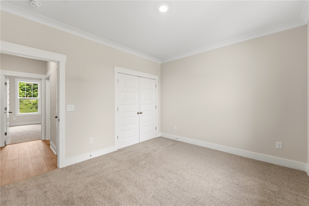 203 Timothy Court Anderson, SC 29621 - Photo 38 of 40 Step into this naturally illuminated bedroom featuring plush carpet and a convenient double-door closet.