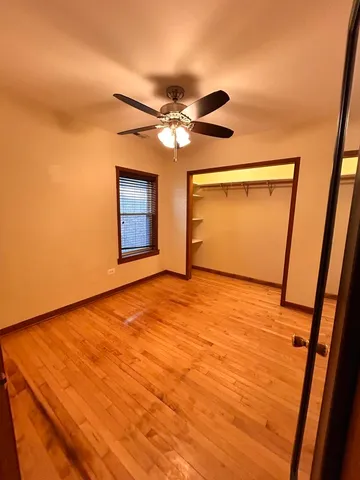 a view of a room with a sink and a mirror