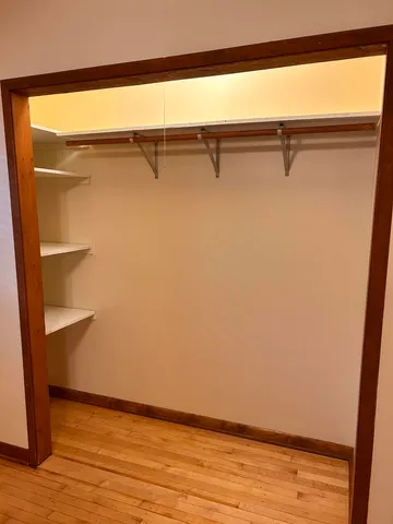 a view of small space with wooden floor