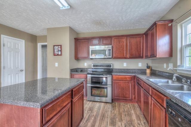 4000 Deer Run Trace Spring Hill, TN 37174 - Photo 7 of 20 Refrigerator is included. The microwave and dual oven where installed in 2013.