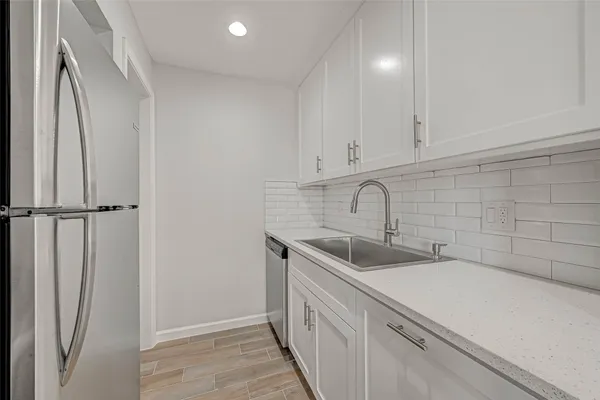 a view of a kitchen with sink