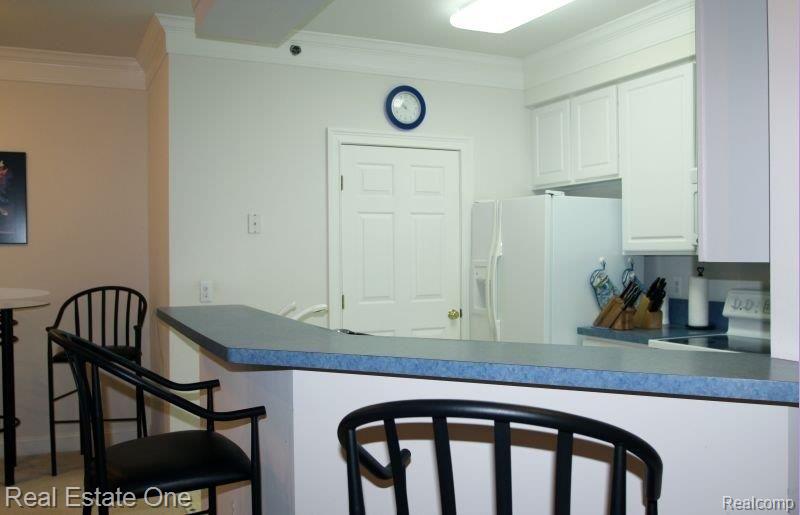 39178 Hayes Road, Unit 23 Clinton Township, MI 48038 - Photo 8 of 18 Kit-door.jpg