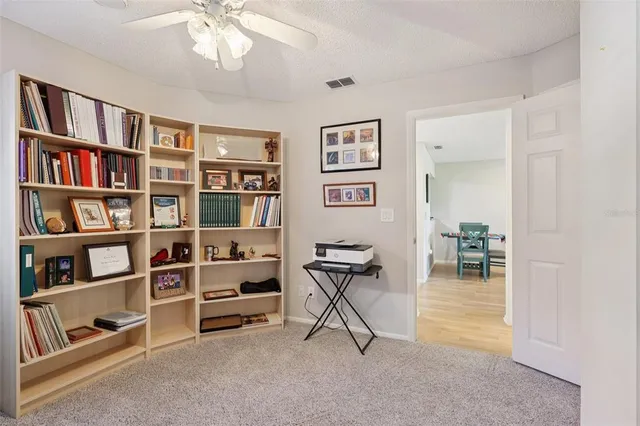 a view of room with cabinet and shelf