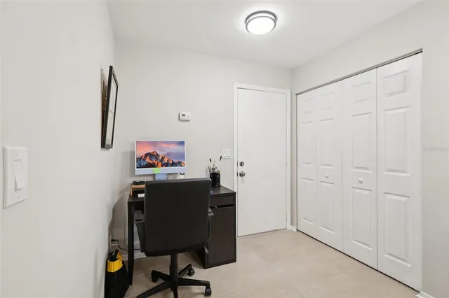 a workspace with furniture and bathroom